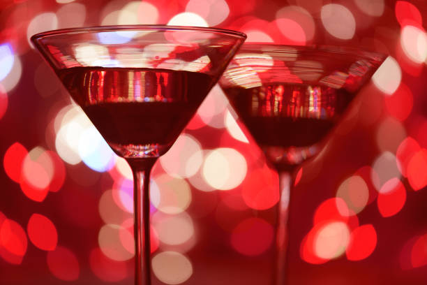 istock martini drink in a glass against a red bokeh light 1191470663