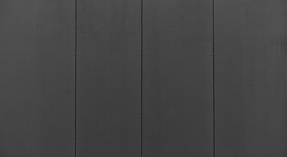 modern materials in the construction industry. Texture of metal cladding of a building facade closeup