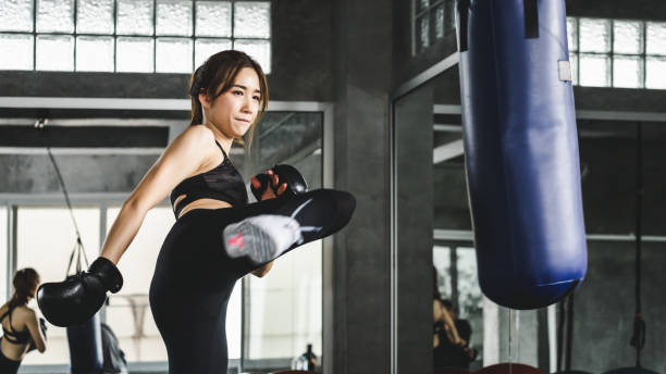istock Athlete woman doing kick boxing training 1191471734
