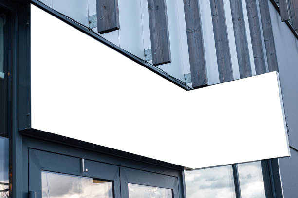 istock Horizontal mock up signboard on the wall outdoors 1191472439