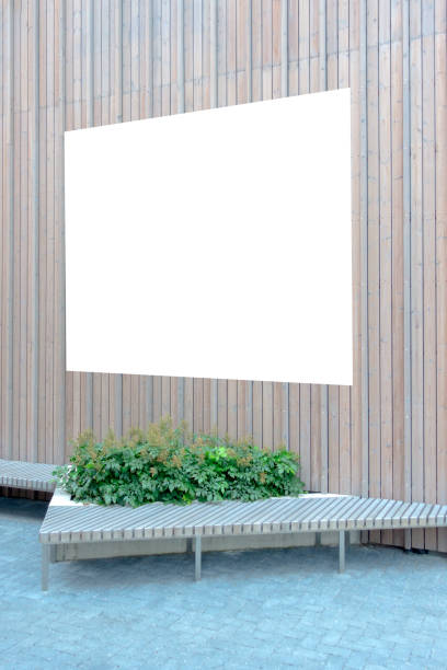 istock Mock up. Blank billboard, poster frame, advertising board on wooden wall with modern bench 1191472791