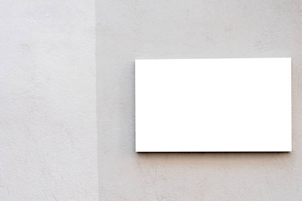 Mock up. Horizontal signboard on the wall outdoors.