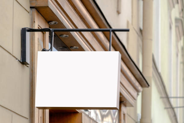 istock Mock up. Blank rectangular shape signboard on the wall of classical architecture building 1191473925