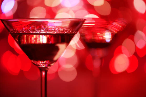 istock martini drink in a glass against a red bokeh light 1191475035