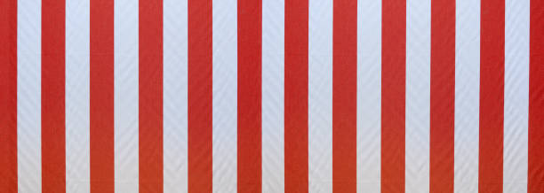 istock Fabric of a red and white striped awning 1191475131