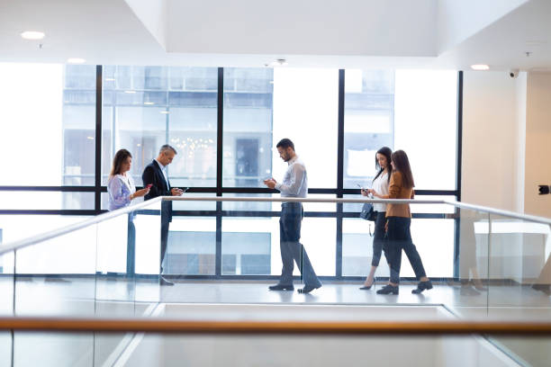 istock Group of people walking at the office 1191481807