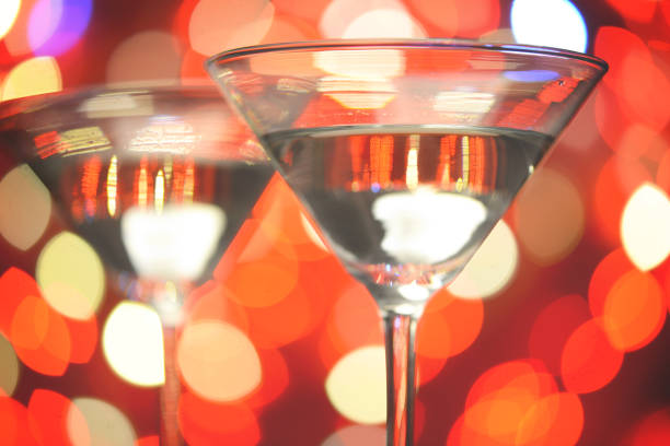 istock martini drink in a glass against a red bokeh light 1191493180