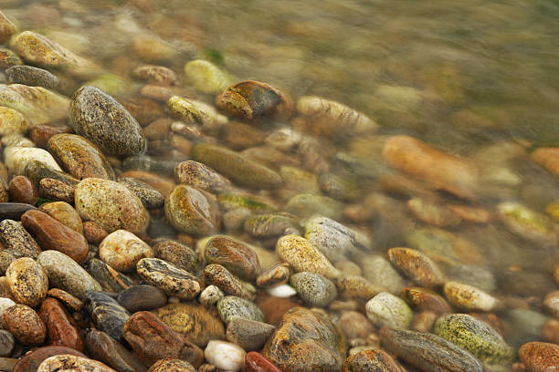 Stones in water stock photo