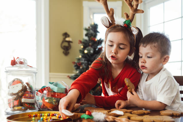 istock Kids making christmas cookies 1191495353