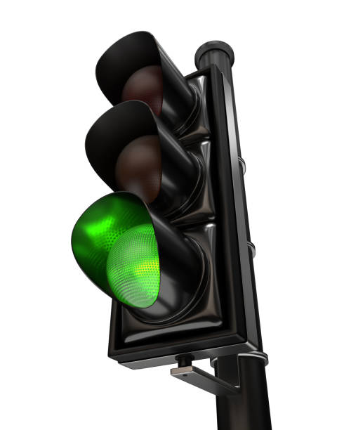 istock Close-up on a traffic light, the green light is on, isolated on white background 1191495590
