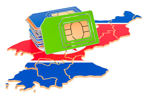 Sim cards on the North Korean map. Mobile communications, roaming in North Korea, concept. 3D rendering isolated on white background