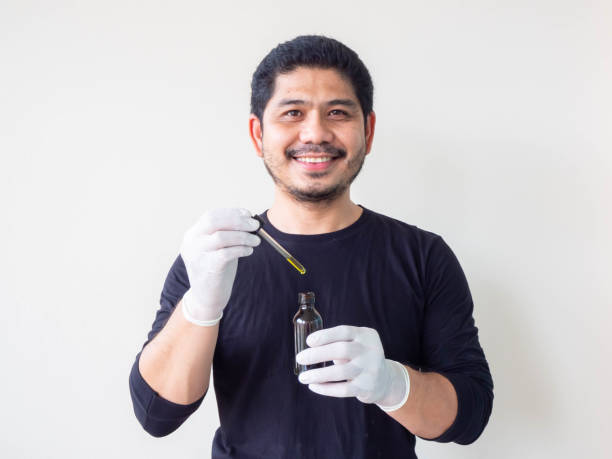 istock A man using Cannabis oil, Healthcare concept. 1191497721