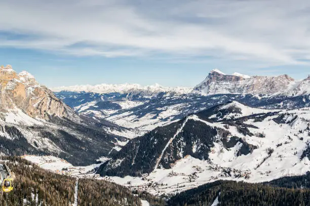Cloudy view of Dolomite Alps near Alta Badia of Val di Fassa, Trentino-Alto-Adige region, Italy.
