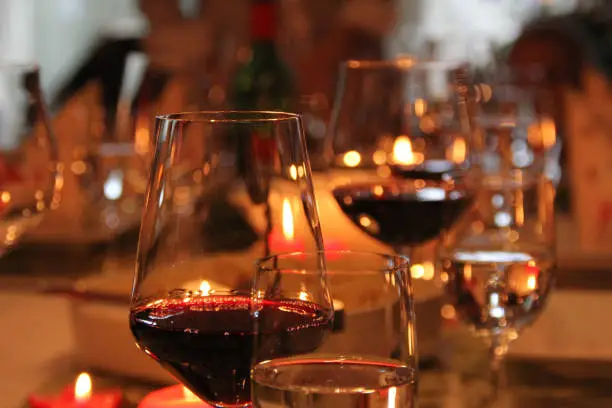 Photo of Festive Christmas decoration with red wine in wine glasses on a table in Fulda, Germany.