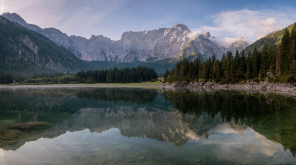 istock beautiful morning at the alpine lake 1191500913