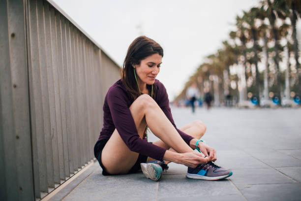 istock Happy woman preparing for the morning run 1191501297