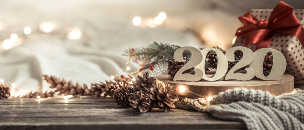 istock Background festive new year background with numbers 2020. 1191501495