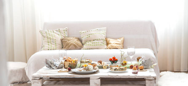 istock The interior of the room with a festive Easter table . 1191502734
