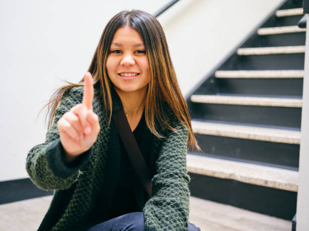istock High School Student Showing Number One 1191504268