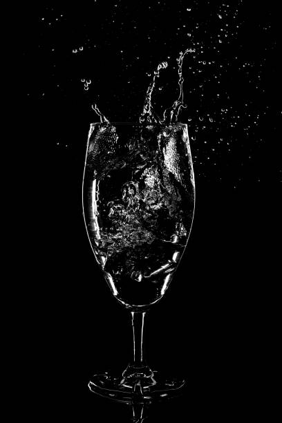 splash of water in a glass on a black background