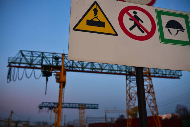 istock Yellow tower cargo crane at the railway station 1191508139