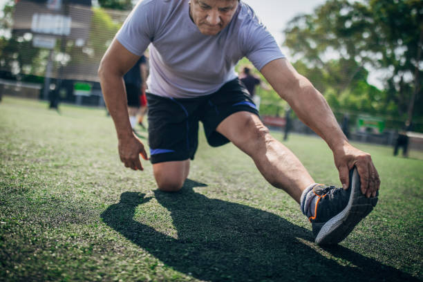 istock Soccer player exercising on soccer field 1191509404