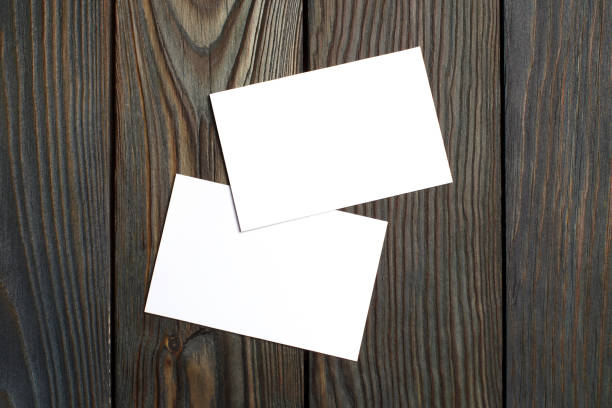 istock Two blank cards on wood 1191509912
