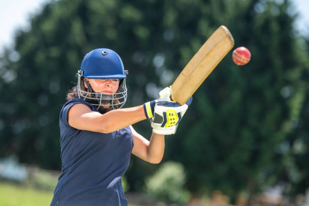 istock Female cricket player batting the ball 1191513024