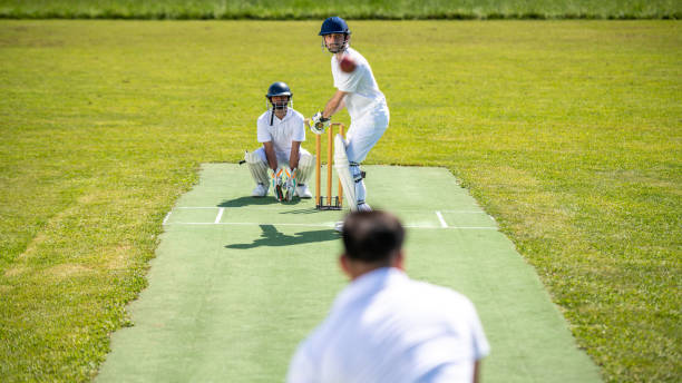 istock Cricket batsman ready to hit the ball 1191513032