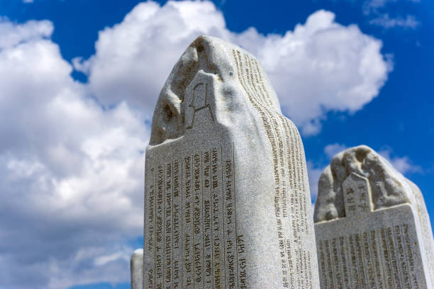 istock historic inscribed stone and cloudy sky 1191521866