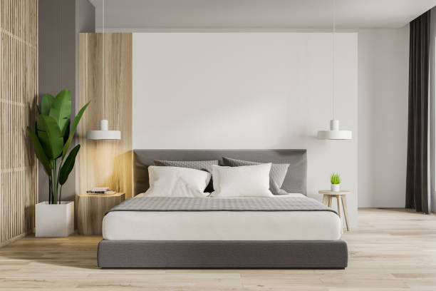 istock White and wooden master bedroom interior 1191521896
