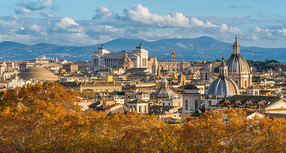 Rome skyline during autumn season, as seen from Castel Sant'Angelo, with the dome of Saint Agnese Church, the Campidoglio and the Altare della Patria monument.