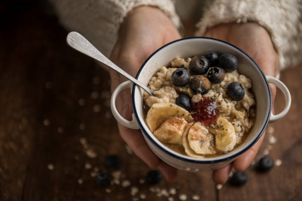 istock Hands offering a vegan porridge 1191522112