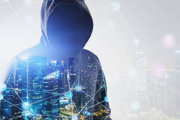 istock Hacker in night city and digital network 1191522164