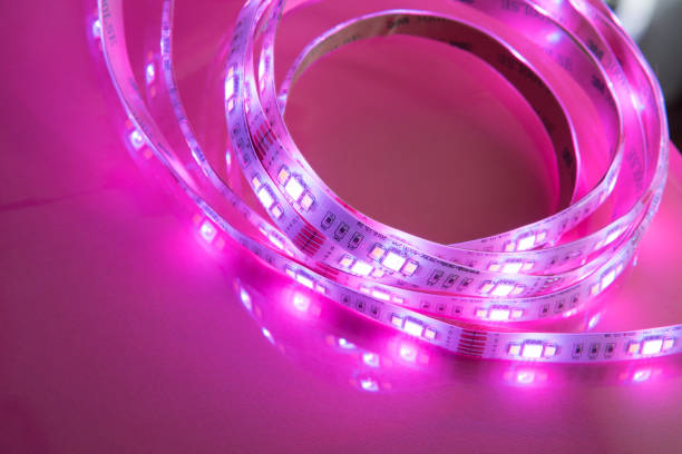 istock Bright neon pink LED strip glows 1191522218