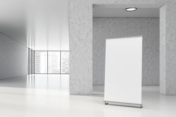 istock Vertical mock up banner in white office hall 1191522235