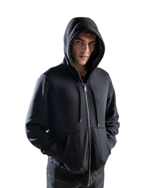 istock Young man in hoodie with hands in pockets 1191522473