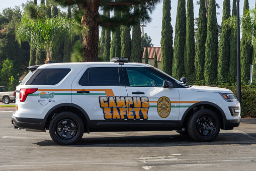 Orange, CA / USA - November 14, 2019: Campus security vehicle for Rancho Santiago Community College District parked at district office in Santa Ana, California.