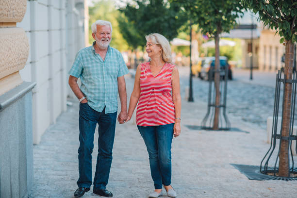 istock Senior couple holding hands 1191526268