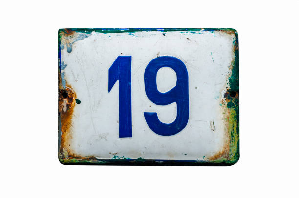 istock Weathered enameled plate number 19 1191526818