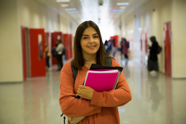 istock Portrait of university student in corridor during break 1191528716