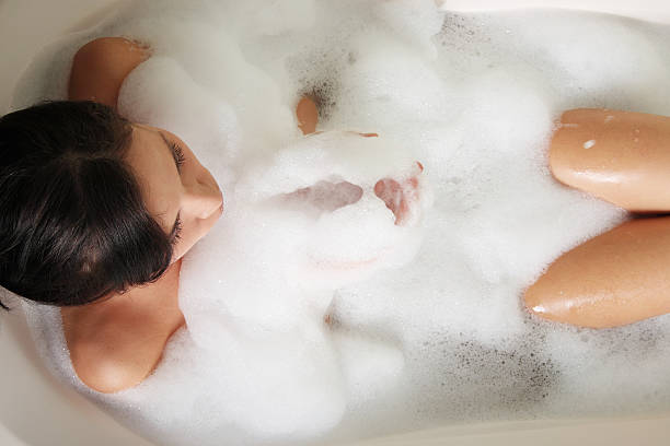 Beautiful woman in the bath. stock photo