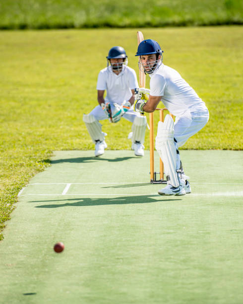istock Cricket batsman ready to hit the ball 1191530513