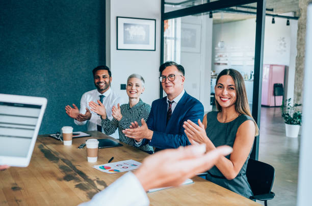 istock Acknowledging a colleague's achievement 1191532734