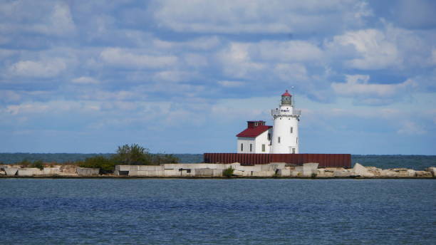istock White lighthouse on island in bay 1191537625
