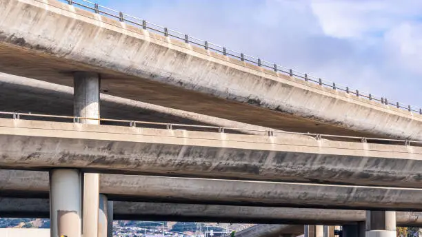 Close up of the concrete ramps of a multilayered freeway interchange in San Francisco bay area, California