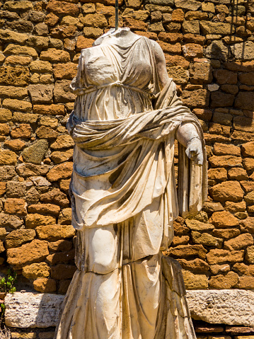 Headless Statue, Ancient Roman archaeological site of Ostia Antica in Rome, Italy