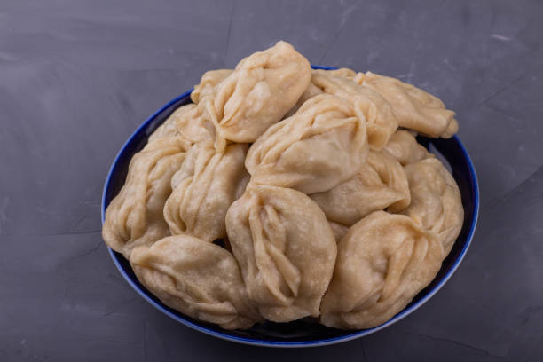 istock Delicious mantas on a plate on gray background 1191548124