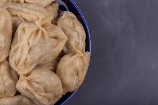 istock Delicious mantas on a plate on gray background 1191548138