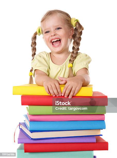 Criança Segurando A Pilha De Livros - Fotografias de stock e mais imagens de Cachos - Cachos, Criança, Fundo Branco